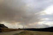 Humareda del incendio sobre el municipio de Velilla del Río Carrión, en Palencia