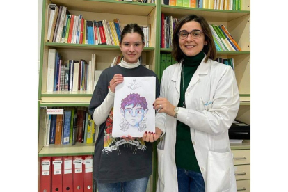 La ganadora, Beatriz Riesco, con su profesora, Ana Abello. DL
