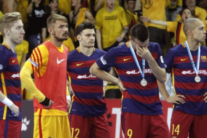 Los jugadores del Barça, afligidos tras perder la Liga ante el Movistar Inter en el Palau.