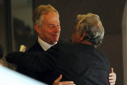 El exprimer ministro británico Tony Blair, recibido tras su llegada Ben Curtis | AP