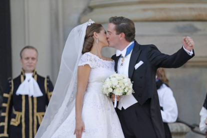 Magdalena de Suecia y Chris O'Neill, tras la ceremonia en la capilla del Palacio Real sueco, este sábado.