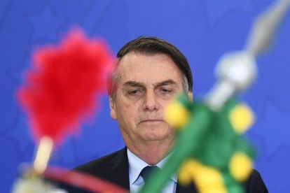 Jair Bolsonaro, presidente de Brasil, en una ceremonia militar. / EVARISTO SA (AFP)