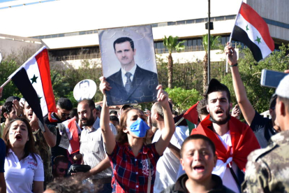 Siria está fracturada entre partidarios y detractores. BADAWI