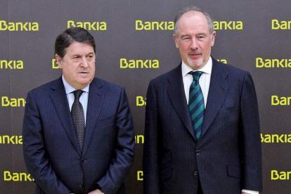 El ex presidente de Bancaja, José L. Olivas, y el de Bankia, Rodrigo Rato, en una imagen de archivo.