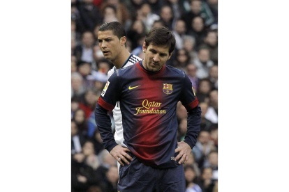 Messi, junto a Cristiano Ronaldo, en el último clásico disputado.