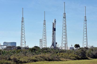 The SpaceX Falcon 9 rocket  scheduled to launch a U S  Air Force navigation satellite  sits on Launch Complex 40 after the launch was postponed after an abort procedure was triggered by the onboard flight computer  at Cape Canaveral