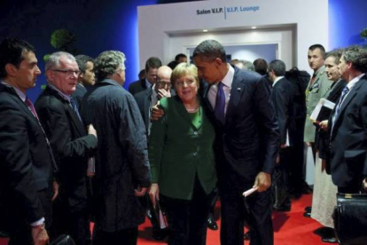 El presidente de EEUU y la cancillera alemana, tras una reunión de líderes de la eurozona en Cannes, en noviembre pasado. PETE SOUZA/ White House Photo Office