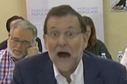 Captura de pantalla de Youtube de la cara de Mariano Rajoy cuando un militante del PP le confundió con el presidente de la República.