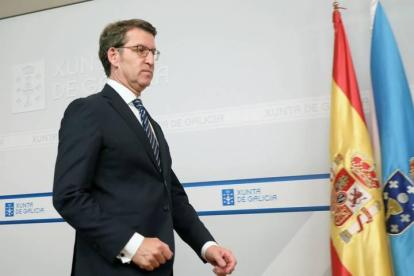 El presidente gallego renuncia a presentar candidatura para suceder a Rajoy.