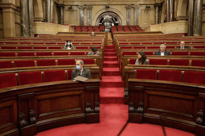 Torra, al comienzo del pleno en el Parlamento catalán. JOB VERMEULEN