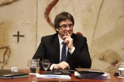 El 'president' Carles Puigdemont, en una reunión de Govern.