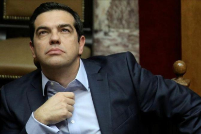 Alexis Tsipras, durante una sesión parlamentaria antes de votarse el presupuesto griego, en Atenas, el 10 de diciembre.