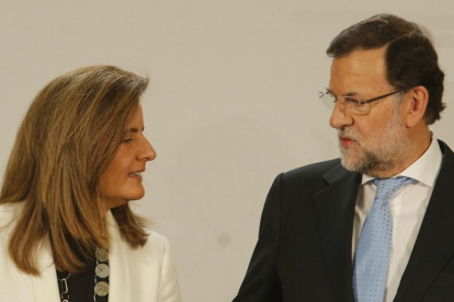 Báñez y Rajoy, en el 2014.