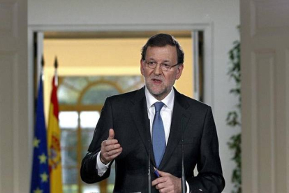 El presidente del Gobierno, Mariano Rajoy, durante la conferencia de prensa que ofreció hoy en el Palacio de la Moncloa tras la última reunión del año del Consejo de Ministros en la que ha hecho un balance político y económico de 2013.