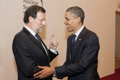 Saludo entre Mariano Rajoy y Barack Obama, en Seúl, el año pasado.