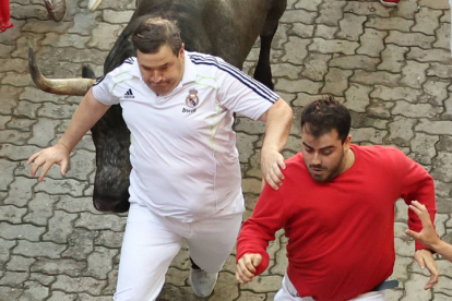 Segundo encierro de los sanfermines 2023. ELOY ALONSO / J. P. URDIOZ / VILLAR LÓPEZ / JESÚS DIGES