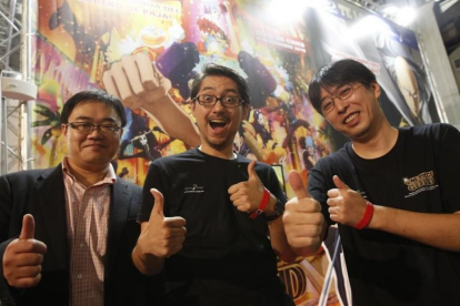El equipo de One Piece Gold, Hiroyuki Sakurada (productor), Hiroaki Miyamoto (director) y Masayuki Sato (director de animación), en el Salón del Manga.