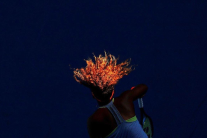 Partido entre Naomi Osaka y Simona Halep en el Abierto de Australia. / DAVID GRAY (REUTERS)