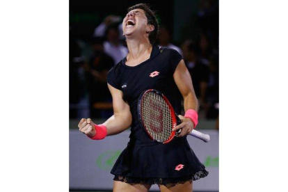 Carla Suárez, eufórica tras batir a Venus Williams en cuartos de final del torneo de Miami.