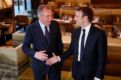 François Bayrou y Emmanuel Macron.