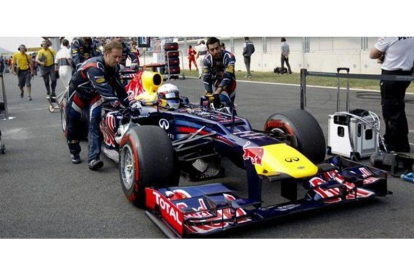 Sebastian Vettel, con su monoplaza, antes de tomar la salida en el Gran Premio de Corea del Sur.