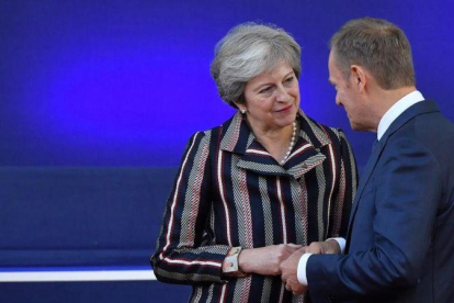 La primera ministra británica, Theresa May, y el presidente del Consejo Europeo, Donald Tusk.