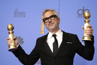 Alfonso Cuarón gana como mejor director en los Globos de Oro 2019 por Roma.