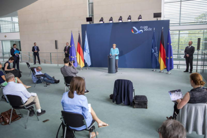 Angela Merkel el lunes, e una rueda de prensa con medidas contra Covid-19. MAJA HITIJ