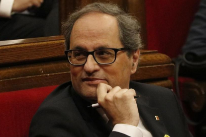 El presidente de la Generalitat, Quim Torra, en el Parlament. /