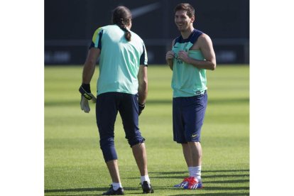 Messi, derecha, y Pinto durante el entrenamiento.