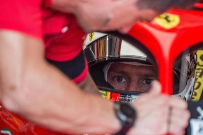 Sebastian Vettel, en el interior de su Ferrari, en el circuito de Hungaroring. /