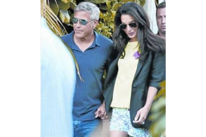 George Clooney y Amal Alamuddin, en Los Ángeles en mayo de este año.