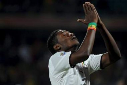 El ghanés Gyan se lamenta tras perder una ocasión de gol.