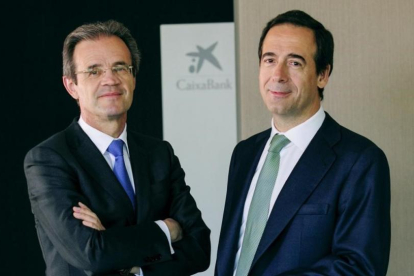 Jordi Gual, presidente de CaixaBank, y Gonzalo Gortázar, consejero delegado.