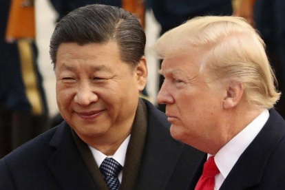 Xi Jinping y Donald Trump, en un encuentro en Pekín, el año pasado.
