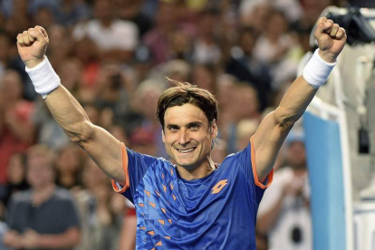 David Ferrer celebra su victoria ante Isner.