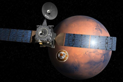 Simulación artística de la misión Exomars 2016 con la nave 'TGO' y el pequeño módulo 'Schiaparelli' (centro) dirigéndose a la superficie de Marte.