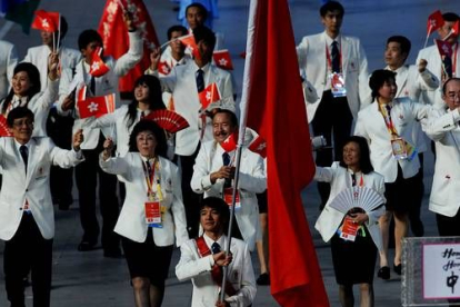 La delegación china, una de las más numerosas, en el desfile inaugural.