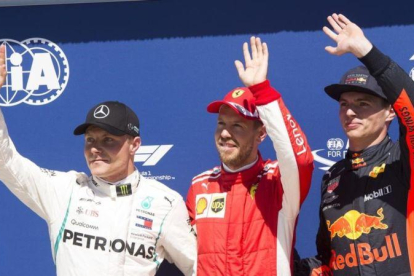 Sebastian Vettel ha logrado hoy la pole en Canadá, siendo más veloz que Valtteri Bottas, a la izquierda, y Max Verstappel, a la derecha.