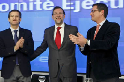 Núñez Feijóo, Rajoy y Basagoiti, en una imagen de archivo durante un acto del PP en Génova.