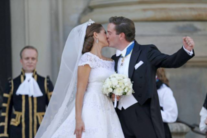 Magdalena de Suecia y Chris O'Neill, tras la ceremonia en la capilla del Palacio Real sueco, este sábado. BJORN LARSSON ROSVALL / SCANPIX | EFE