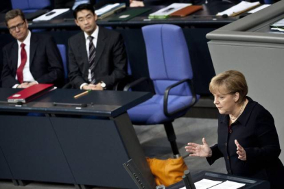 La canciller alemana, Angela Merkel, interviene ante el Parlamento federal, hoy.