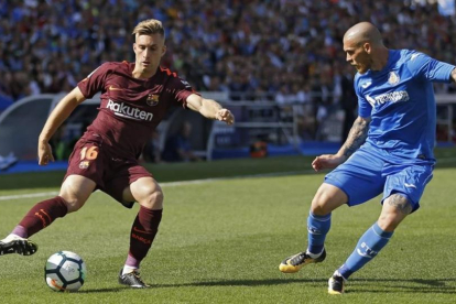 Deulofeu, durante una acción en campo del Getafe.