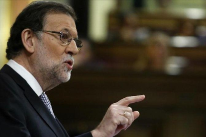 El candidato a la reelección, Mariano Rajoy, durante el debate de investidura el jueves 27 de octubre.