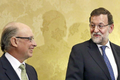Montoro y Rajoy.