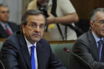 El primer ministro griego, Antonis Samaras y el ministro de Finanzas, Vassilis Rapanos.