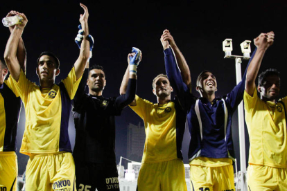 Juan Pablo, tercero por la izquierda, celebra el título de Liga.