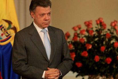 El presidente colombiano, Juan Manuel Santos, pronuncia un discurso durante el acto de posesión de nuevos ministros y funcionarios, ayer.
