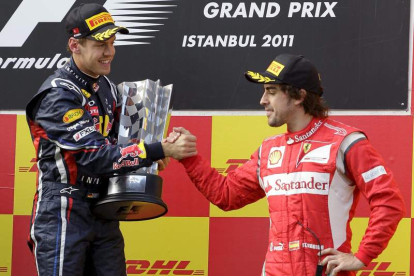 Sebastian Vettel, de Red Bull Racing, y el piloto asturiano Fernando Alonso, de Ferrari.
