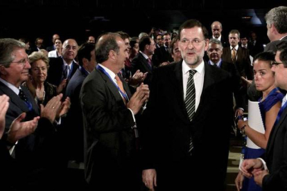 Rajoy, aplaudido tras su intervención en la asamblea general ordinaria de la Ceoe.